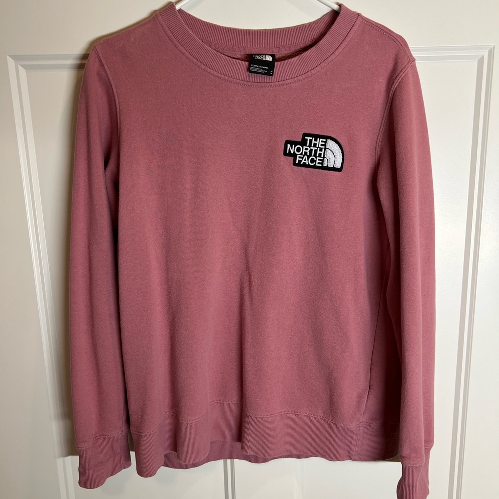 Woman’s north face pink crewneck